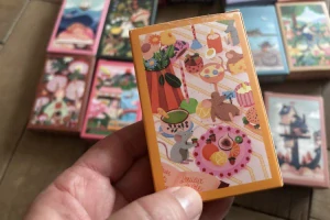 Puzzle do kapsy Myší hostina (99 dílků, 10 x 14 cm) 